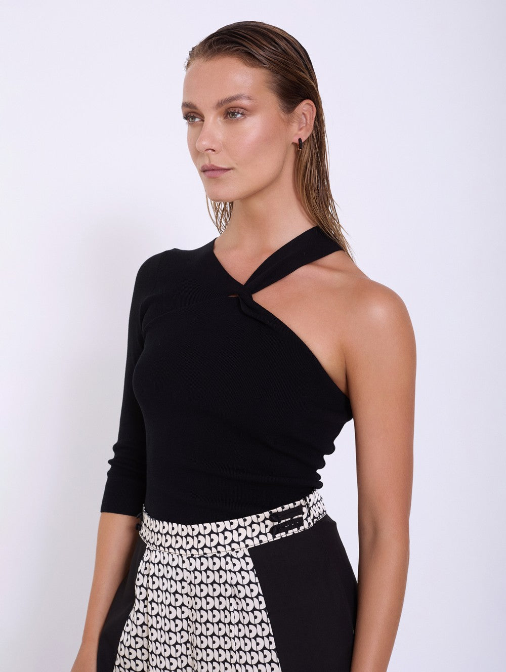 Top asymmetrico