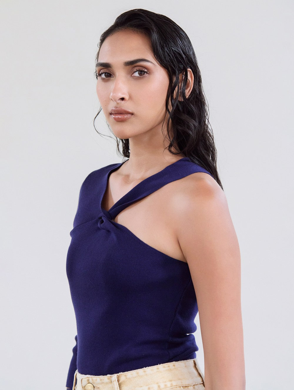 Top asymmetrico