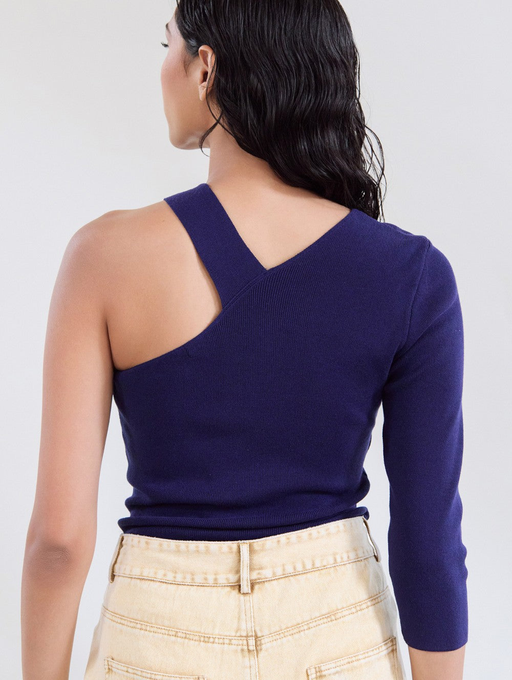 Top asymmetrico