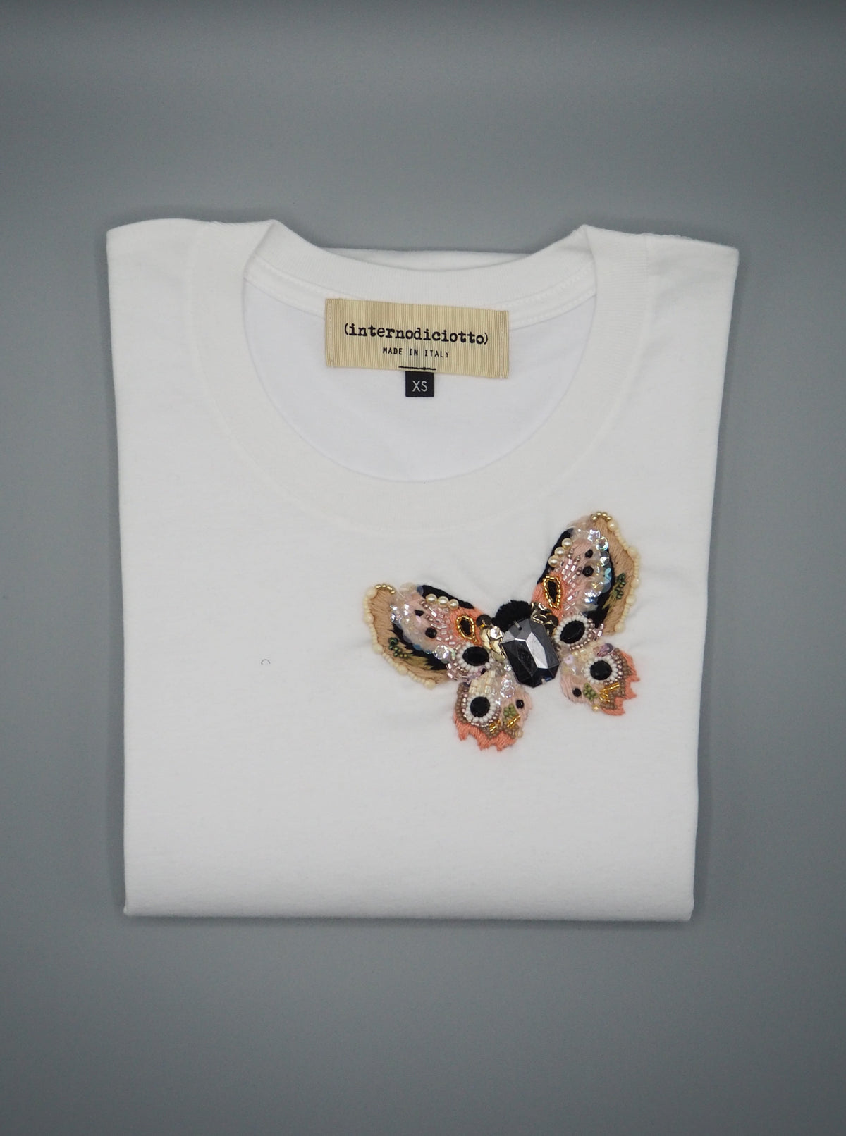 Maglietta con farfalla chic
